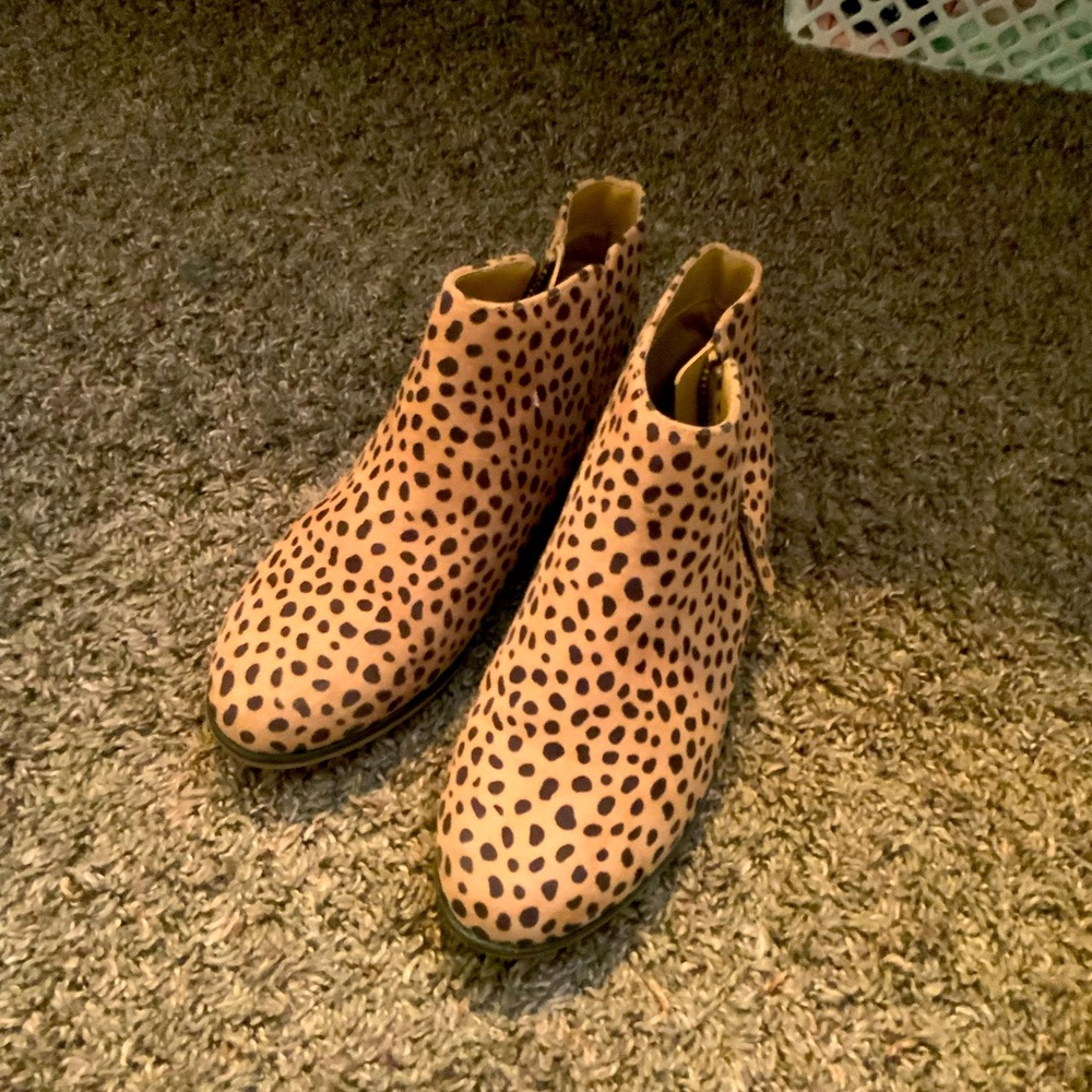Cheetah print shoes size is kids 3 message me if interested